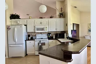 2002 E Del Webb Boulevard, Sun City Center, FL 33573 - Photo 11