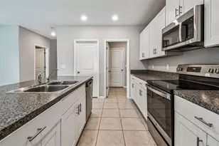 7205 Ronnie Gardens Ct, Tampa, FL 33619 - Photo 11