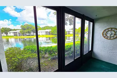 1109 Pine Ridge Circle W #C1, Tarpon Springs, FL 34688 - Photo 13