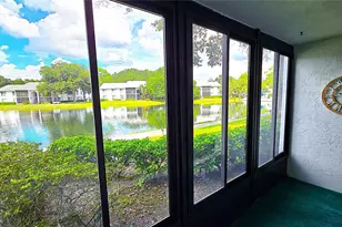 1109 Pine Ridge Cir W, Tarpon Springs, FL 34688 - Photo 13