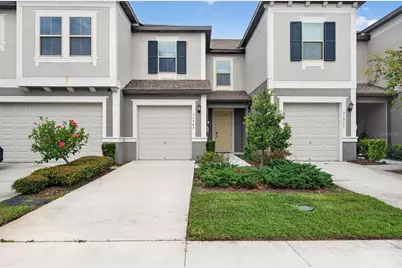 31967 Blue Passing Loop, Wesley Chapel, FL 33545 - Photo 1