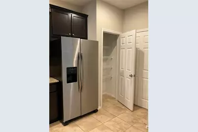 8827 Turnstone Haven Place, Tampa, FL 33619 - Photo 9