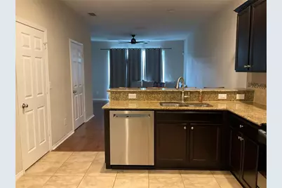 8827 Turnstone Haven Place, Tampa, FL 33619 - Photo 11