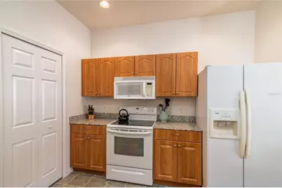 21008 Sunpoint Way #203, Lutz, FL 33558 - Photo 17