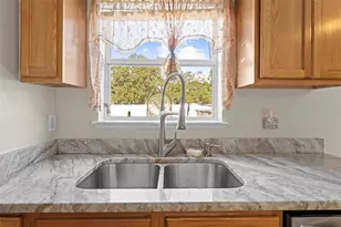 7319 Lagoon Rd, Spring Hill, FL 34606 - Photo 19