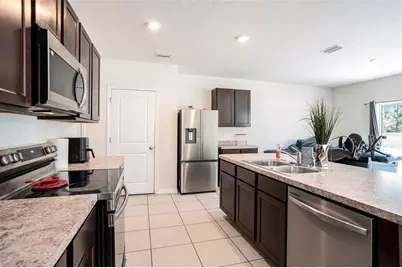 10023 Merry Fawn Court, Sun City Center, FL 33573 - Photo 7