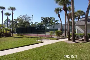 1345 Pine Ridge Cir E, Tarpon Springs, FL 34688 - Photo 17