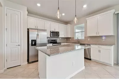 10050 Brown Burrow Street, Orlando, FL 32829 - Photo 9