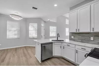 3290 Covered Bridge Drive W, Dunedin, FL 34698 - Photo 7