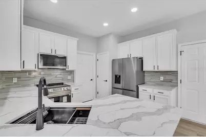 3290 Covered Bridge Drive W, Dunedin, FL 34698 - Photo 5