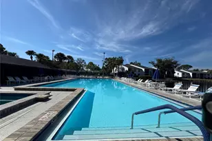 1372 Pine Ridge Cir E, Tarpon Springs, FL 34688 - Photo 21