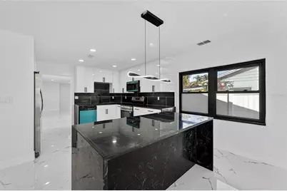 4712 E Serena Drive, Tampa, FL 33617 - Photo 19