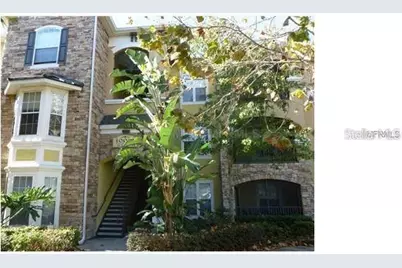 10021 Courtney Palms Boulevard #202, Tampa, FL 33619 - Photo 1