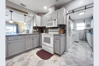 1308 Bluewater Drive, Sun City Center, FL 33573 - Photo 13