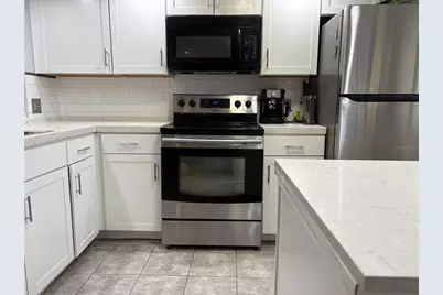 2420 Winding Creek Boulevard #101, Clearwater, FL 33761 - Photo 3