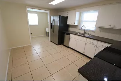 7825 Birchwood Drive, Port Richey, FL 34668 - Photo 11