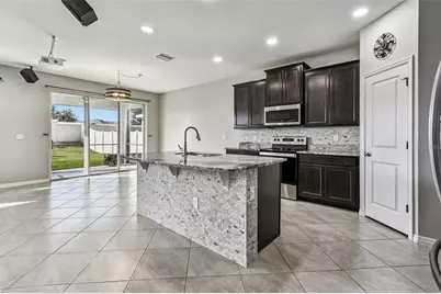 8389 Bower Bass Circle, Wesley Chapel, FL 33545 - Photo 13