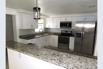 3908 Beechwood Boulevard, Tampa, FL 33619 - Photo 13