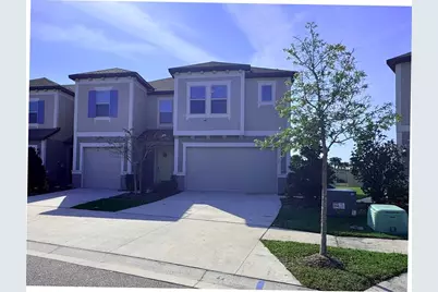 31779 Blue Passing Loop, Wesley Chapel, FL 33545 - Photo 1