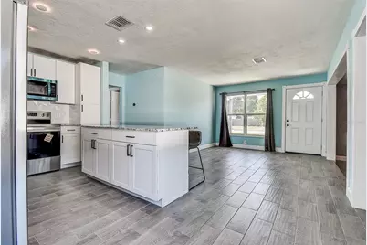 7583 Meadowlawn Drive N, Saint Petersburg, FL 33702 - Photo 7