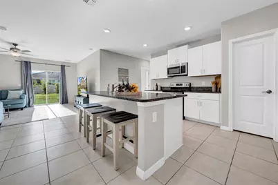 31440 Barrel Wave Way, Wesley Chapel, FL 33545 - Photo 5