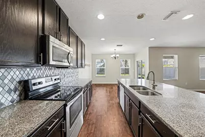 10233 Newminster Loop, Ruskin, FL 33573 - Photo 7