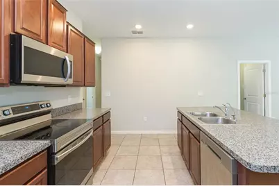 10040 Carloway Hills Drive #10040, Wimauma, FL 33598 - Photo 11