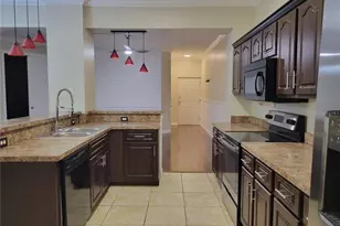 5009 Sunridge Palms Dr, Tampa, FL 33617 - Photo 5