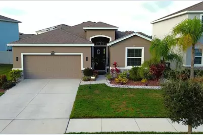 33034 Sand Creek Drive, Wesley Chapel, FL 33543 - Photo 1