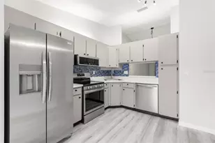 1371 Pine Ridge Cir E, Tarpon Springs, FL 34688 - Photo 7