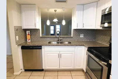 2420 Winding Creek Boulevard #103, Clearwater, FL 33761 - Photo 11