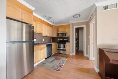 10365 Paradise Boulevard #22, Treasure Island, FL 33706 - Photo 13