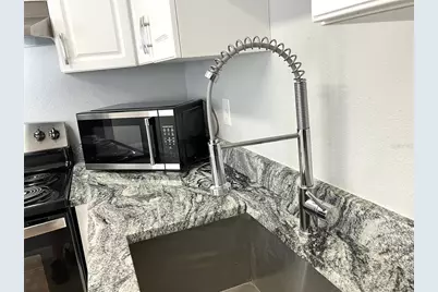 11703 Raintree Village Boulevard #B, Temple Terrace, FL 33617 - Photo 21