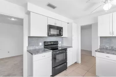 13963 Trinidad Drive, Seminole, FL 33776 - Photo 9