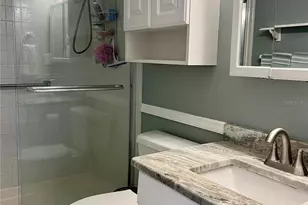 1151 Pine Ridge Cir W, Tarpon Springs, FL 34688 - Photo 17