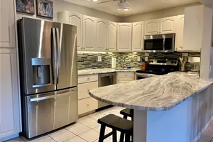 1151 Pine Ridge Cir W, Tarpon Springs, FL 34688 - Photo 9