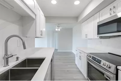 10355 Paradise Boulevard #213, Treasure Island, FL 33706 - Photo 25