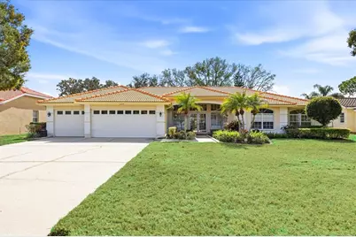 3196 Crescent Oaks Boulevard, Tarpon Springs, FL 34688 - Photo 1