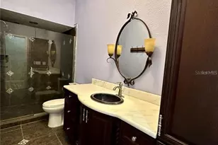 8133 Misty Oaks Blvd, Sarasota, FL 34243 - Photo 19