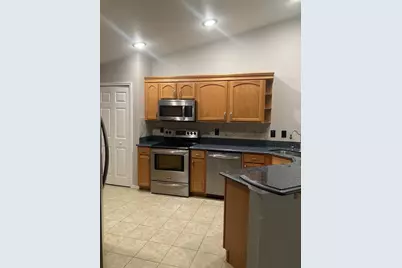 1819 Hammocks Avenue #1819, Lutz, FL 33549 - Photo 7