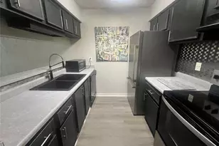 3595 Whispering Oaks Ln, Palm Harbor, FL 34684 - Photo 7