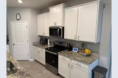 10437 Laxer Cay Loop, San Antonio, FL 33576 - Photo 5