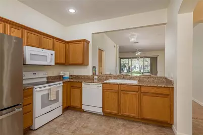 3349 Covered Bridge Dr W, Dunedin, FL 34698 - Photo 5