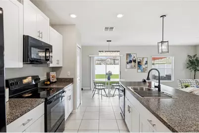 7011 Samuel Ivy Drive, Tampa, FL 33619 - Photo 9