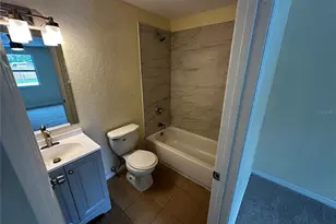 3704 Meadowbreeze Dr, Tampa, FL 33619 - Photo 13