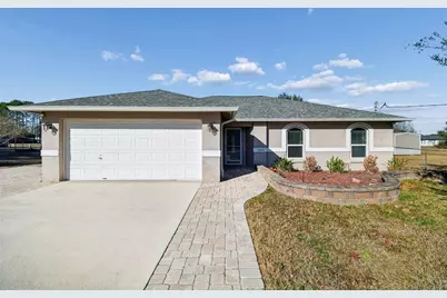 31609 Hunt Club Lane, Wesley Chapel, FL 33543 - Photo 1