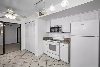 10626 Longwood Drive #102, Seminole, FL 33777 - Photo 11