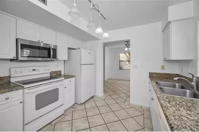 10626 Longwood Drive #102, Seminole, FL 33777 - Photo 9