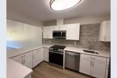 3505 Tarpon Woods Boulevard #J408, Palm Harbor, FL 34685 - Photo 3