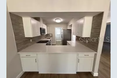 3505 Tarpon Woods Boulevard #J408, Palm Harbor, FL 34685 - Photo 11